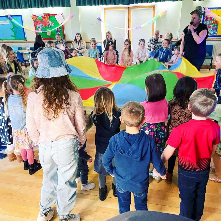 Children playing parachute games